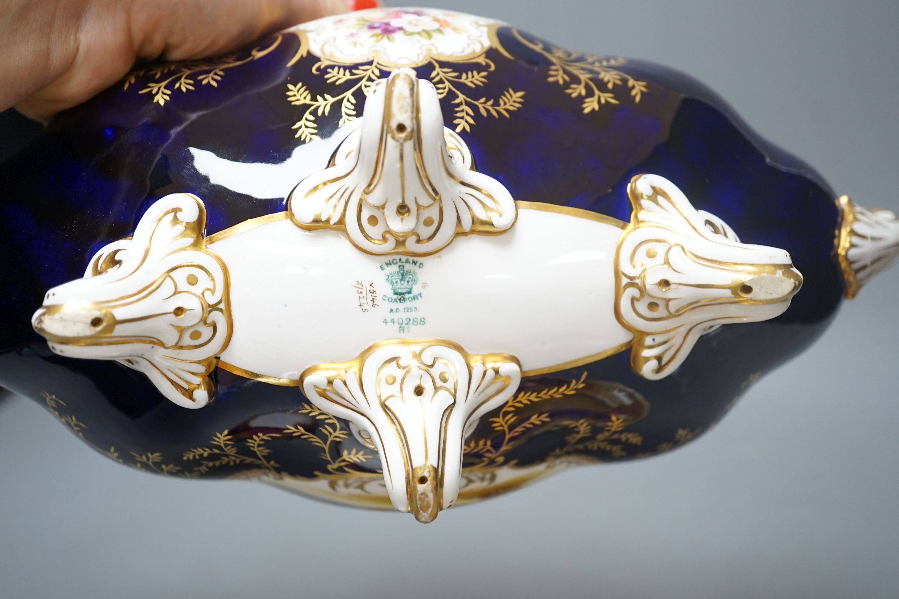 A Coalport navette shaped bowl, pattern v5146, 34cm long, and an Aynsley cup and saucer, pattern 946